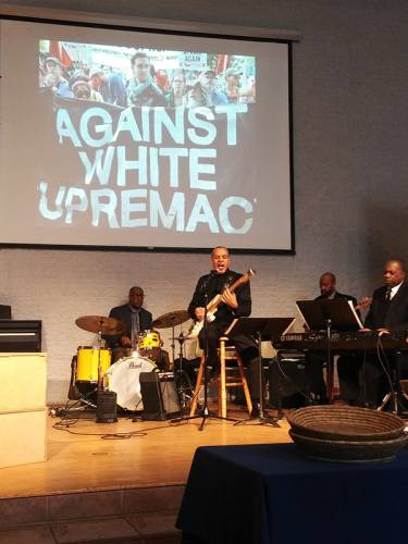 Musicians playing at anti-racism event