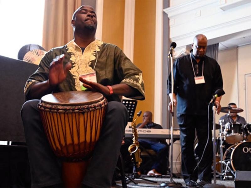 The Rev. Alonzo Johnson provided powerful drumming during the Convocation for Communities of Color. (Photo by Rich Copley)
