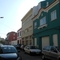 The Butterfields' street in Figueira da Foz; our home is in the blue building on the right.