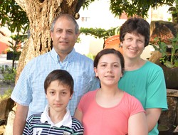 Photo of Katie Griffin with her husband and two children.