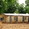 The current student housing at the Guecheme Bible School, which is in very bad condition.  Six families live in this single structure, each with one room that opens to the outside, where they do their