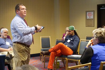 Gordon Mikoski, associate professor of Christian Education at Princeton Theological Seminary, presents at the 2016 APCE meeting in Chicago. Mark Hinds (seated in blue shirt, left) also presented during ‘The Confirmation Project’ workshop.