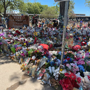 Robb Elementary flowers and gifts in front place there after school shooting in Uvalde TX