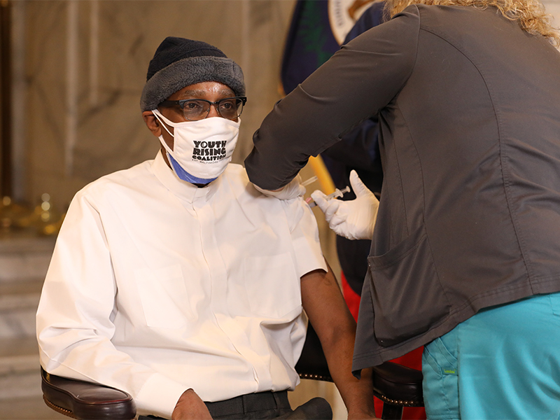 Stated Clerk of the General Assembly, the Rev. Dr. J. Herbert Nelson, receives COVID-19 vaccine in early 2021.