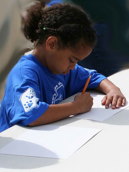 Young Girl Writing