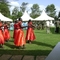 Antiphonal dance at the South Sudanese students' graduation party (red dresses for the blood of all who have died; Army fatigues for the SPLA, and white and blue for the church)