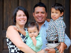 Photo of Amanda Craft and her husband Omar and her infant son, Ethan Alejandro.