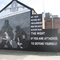 Recently painted mural  depicting Loyalist paramilitary gunmen in East Belfast 