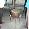 Sterilize with charcoal.jpg At the Luebo hospital, sterilization of instruments is done over a charcoal fire 