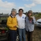 Carolyn, Anna, and Kathleen hold kohlrabi harvested at Heritage Farm community garden in Vancouver, Wash