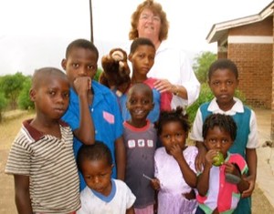 Roberta Updegraff with a group of children in Malawi