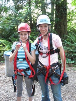 Abby Brockway and her daughter Sienna at Action Camp learning to climb.