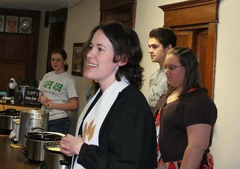 Rev. Elizabeth Campbell-Maleke blesses Souper Bowl of Caring meal.