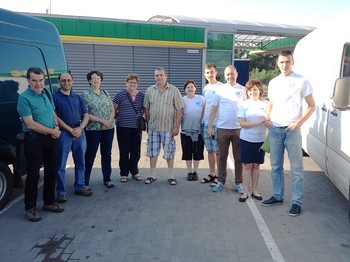 Paetzold, Beblawi, Smith and Morey of the PC(USA) with the local volunteer team in Zaporizhia, Ukraine, before driving toward the war zone to deliver food supplies to a shell-damaged town.