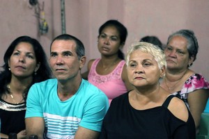 Worshipers at the Presbyterian Mission in Holguin pay close attention to the sermon.