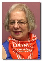 PW supporter wearing orange UNiTE scarf