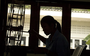 Woman trafficked into blue jeans sweatshop