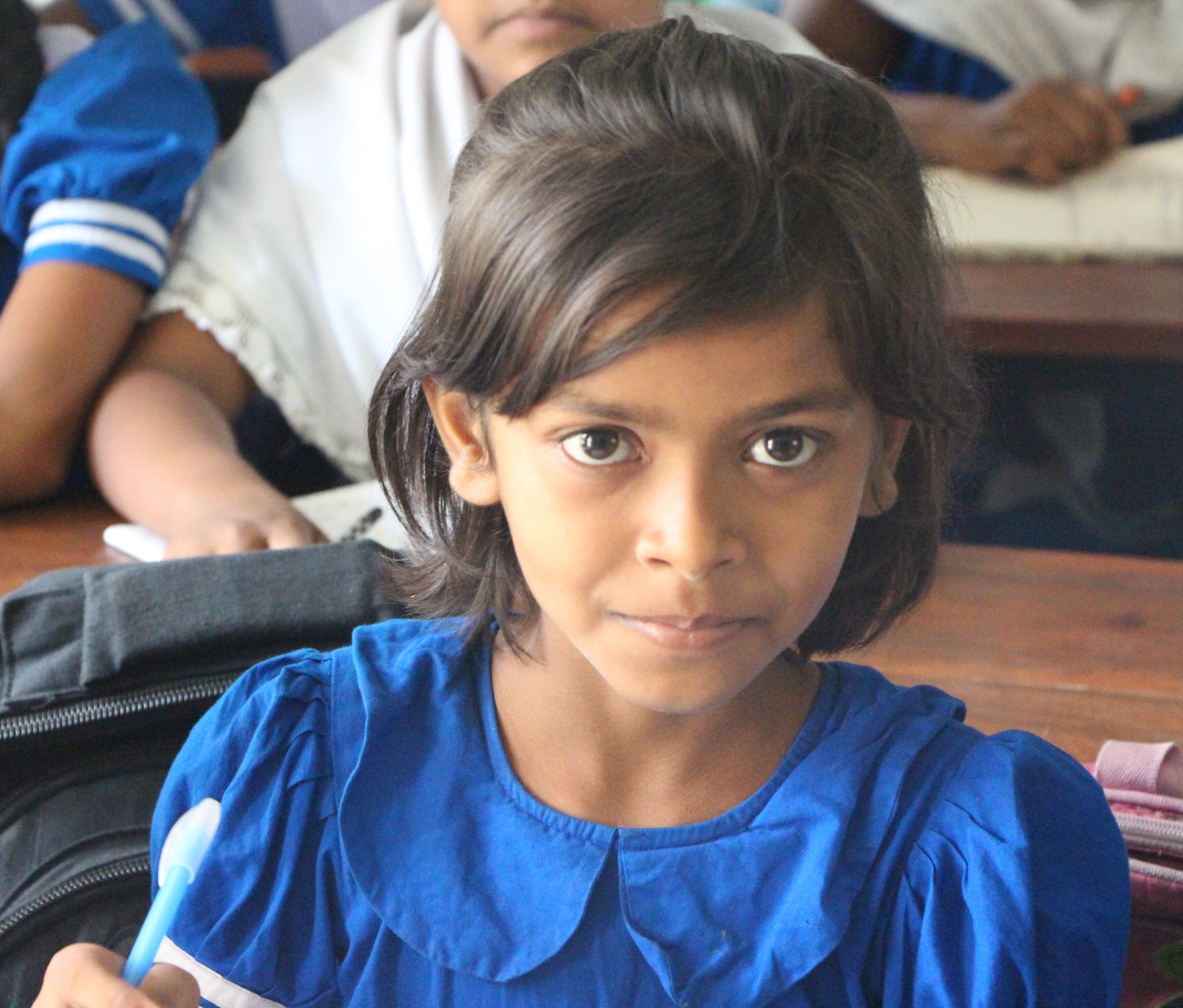 Young female student in class